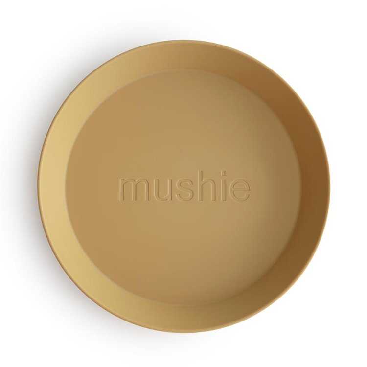 MUSHIE Kulatý talíř 2-balení Mustard Mushie